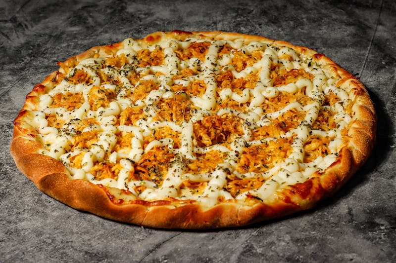 Buffalo Chicken Pizza with blue cheese drizzle